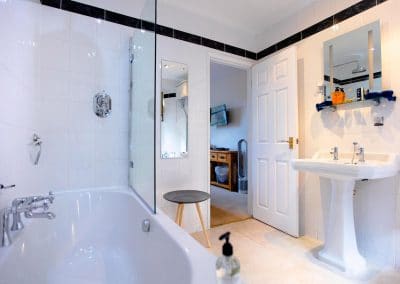 En-Suite bathroom with a shower looking out into the super-king bedroom overlooking Coronation Park.